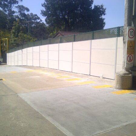 DuneWall with AcoustX Panel by Wallmark Australia bolted to concrete 2.4m high at Mitsubishi Sydney NSW