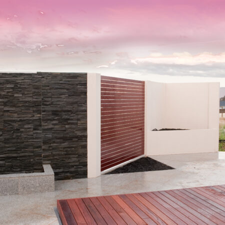 UrbanWall with AcoustX, slat infill and stone featured panelling by Wallmark Australia. 2.1m high at Wodonga VIC